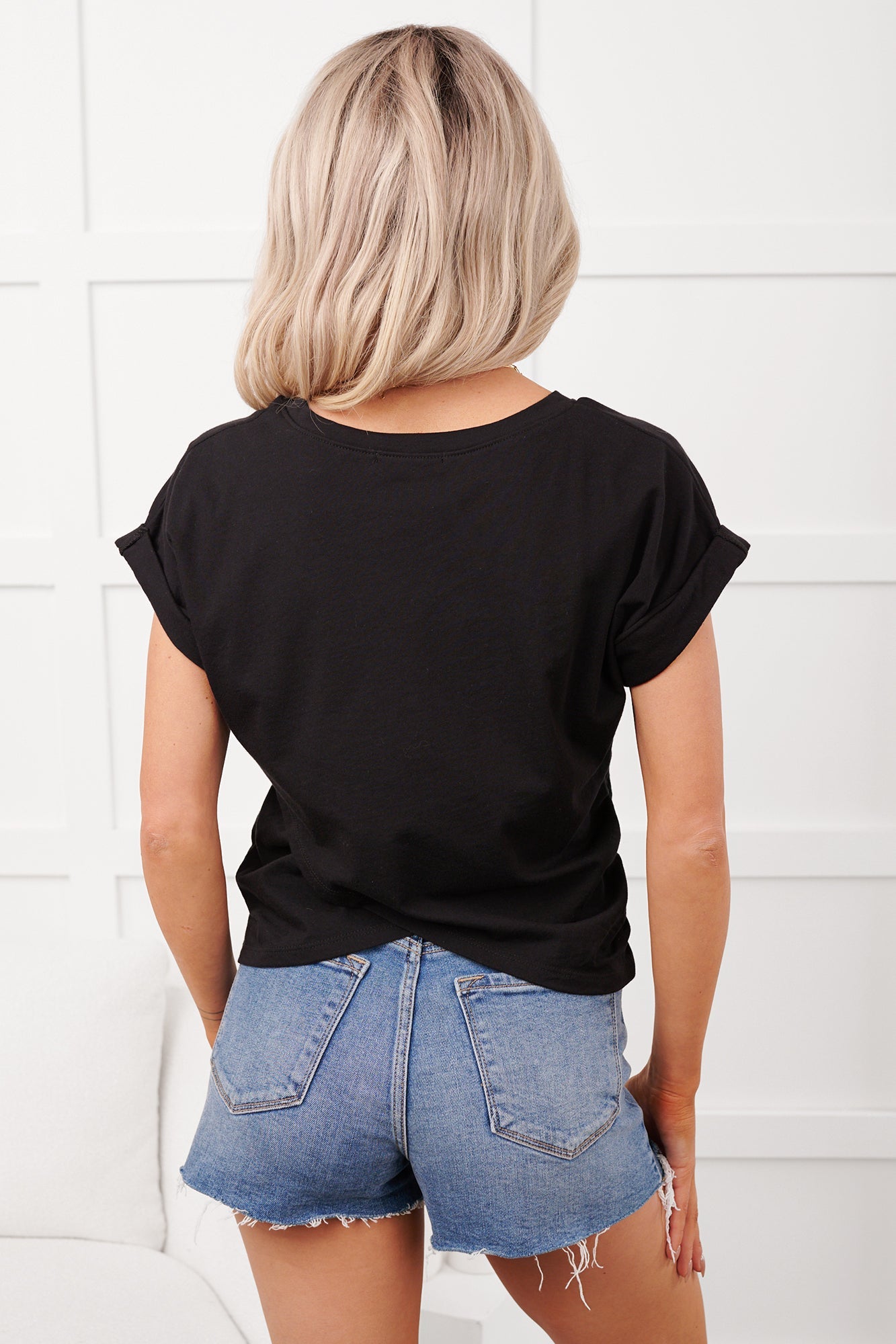 Soft Season Asymmetrical Tulip Hem Knit Top (Black)